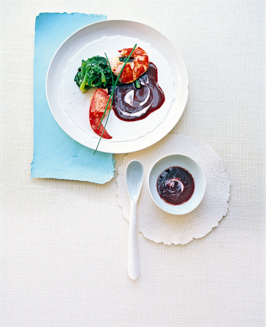 Lobster with red wine butter on plate