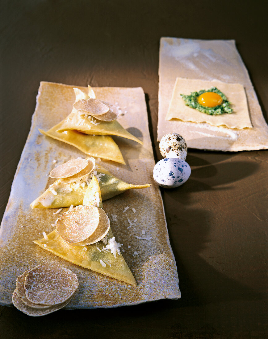 Ravioli with white truffle, quail eggs and parsley puree