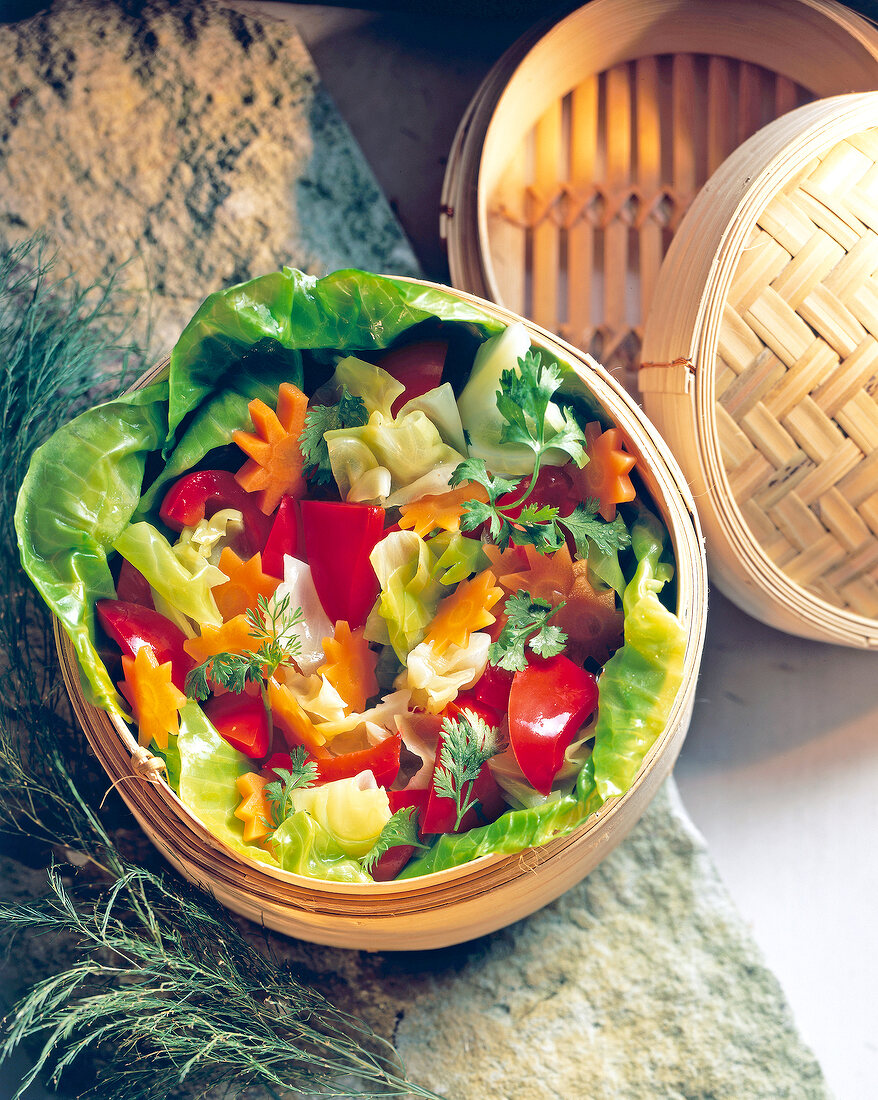 Steamed vegetables in bamboo basket