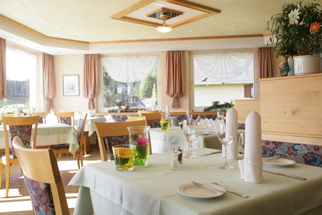 Tables laid in restaurant, Germany