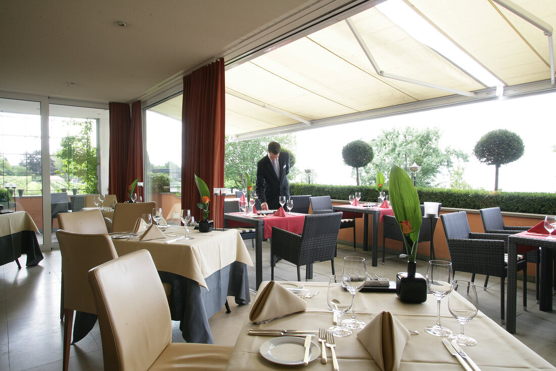 Tables laid in restaurant, Germany