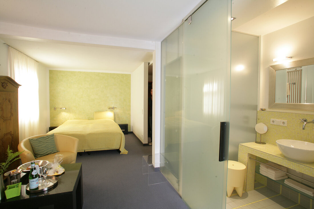 Bedroom with bathroom of hotel, Germany