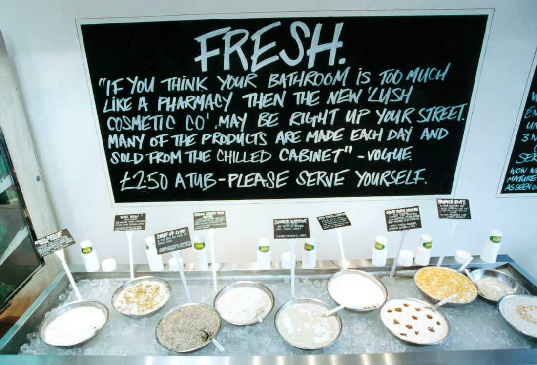 Various handmade fresh creams kept on the counter in a shop