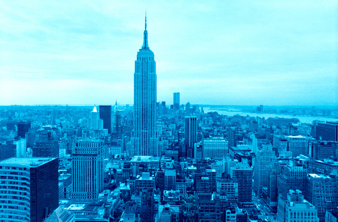 View of skyscrapers and cityscape of New York from blue glass, New York, USA