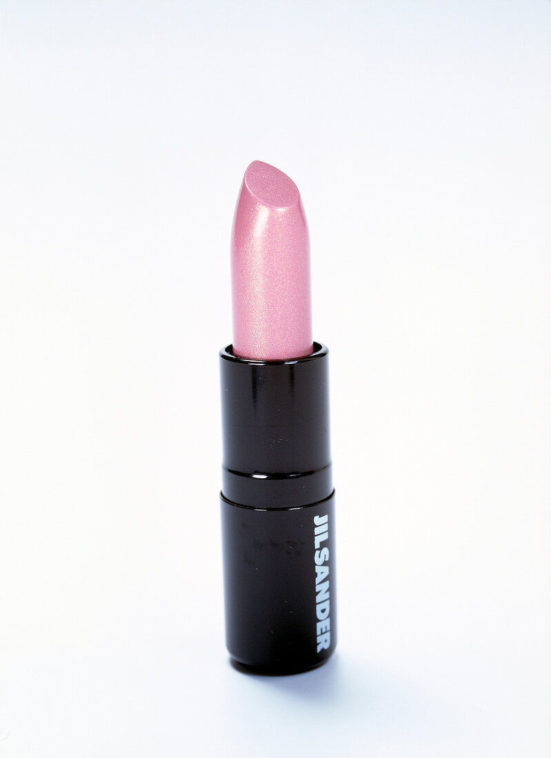 Close-up of pink lipstick on white background