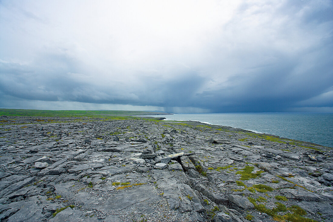 View of Burren with rocky lunar landscape and sea in Ireland
