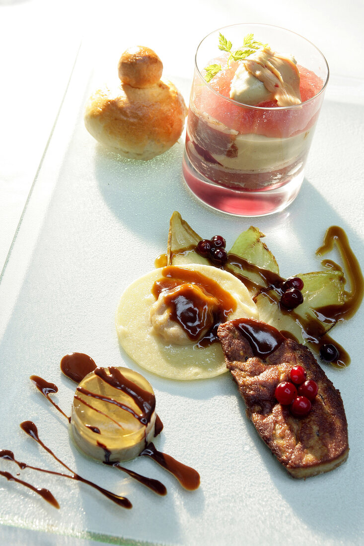 Foie gras with sauce and glass in serving dish at the Savoy, Moscow