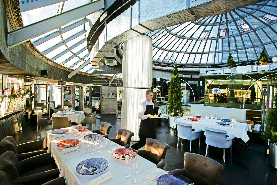 Interior of Restaurant Kupol with dome shaped glass roof, Moscow