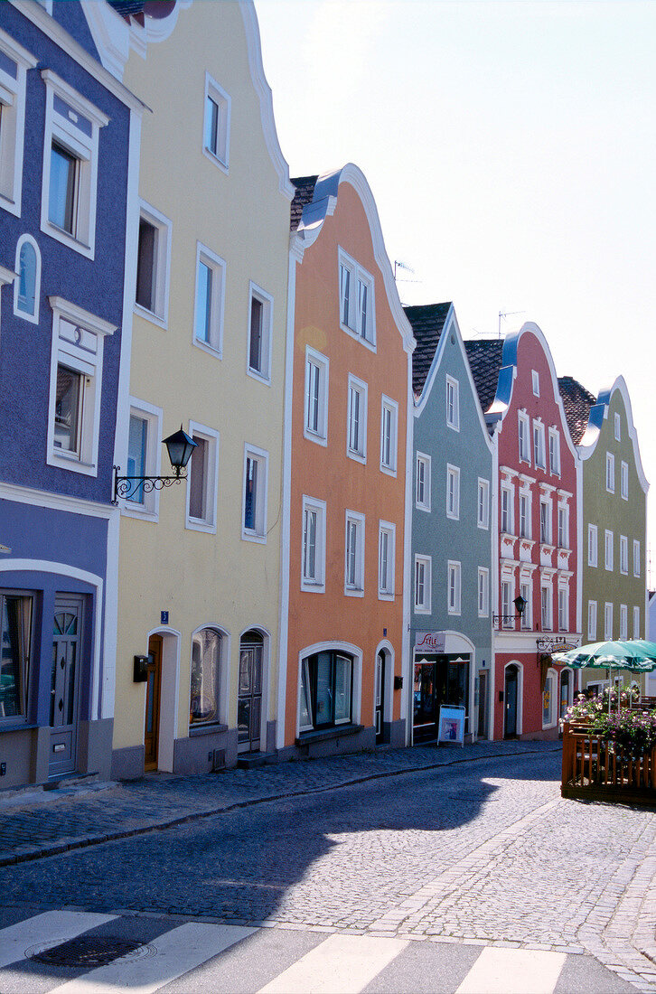 View of facade bof colourful houses and street in Passau, Germany