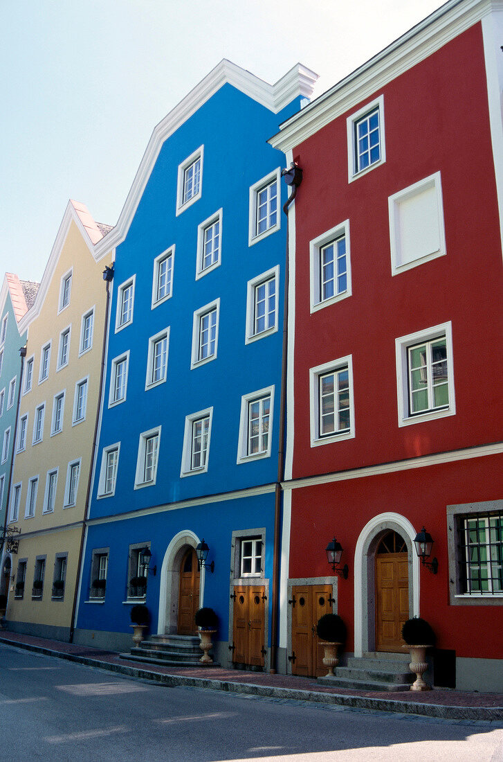 Facade of colourful houses and street in Passau, Germany