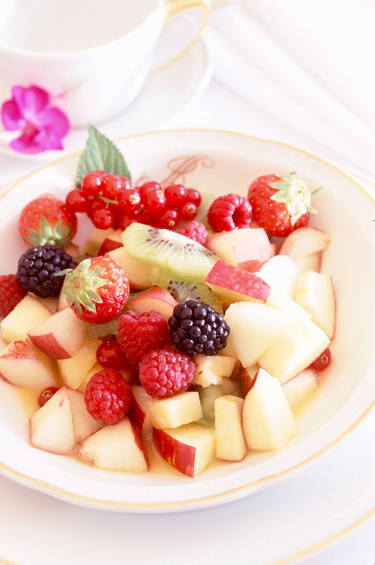 Close-up of colourful fruit salad in bowl