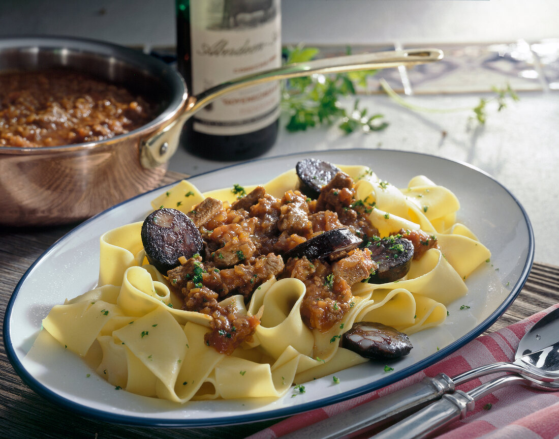 Pasta with beef ragout in serving dish
