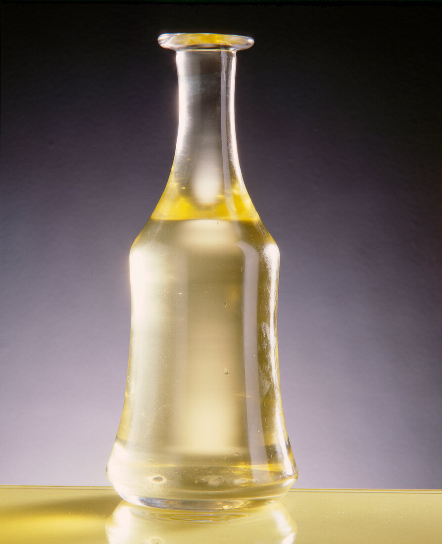 Close-up of bottle with safflower oil