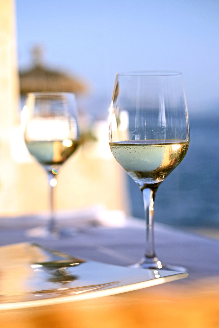 Two glasses of white wine on table in Mallorca, Spain