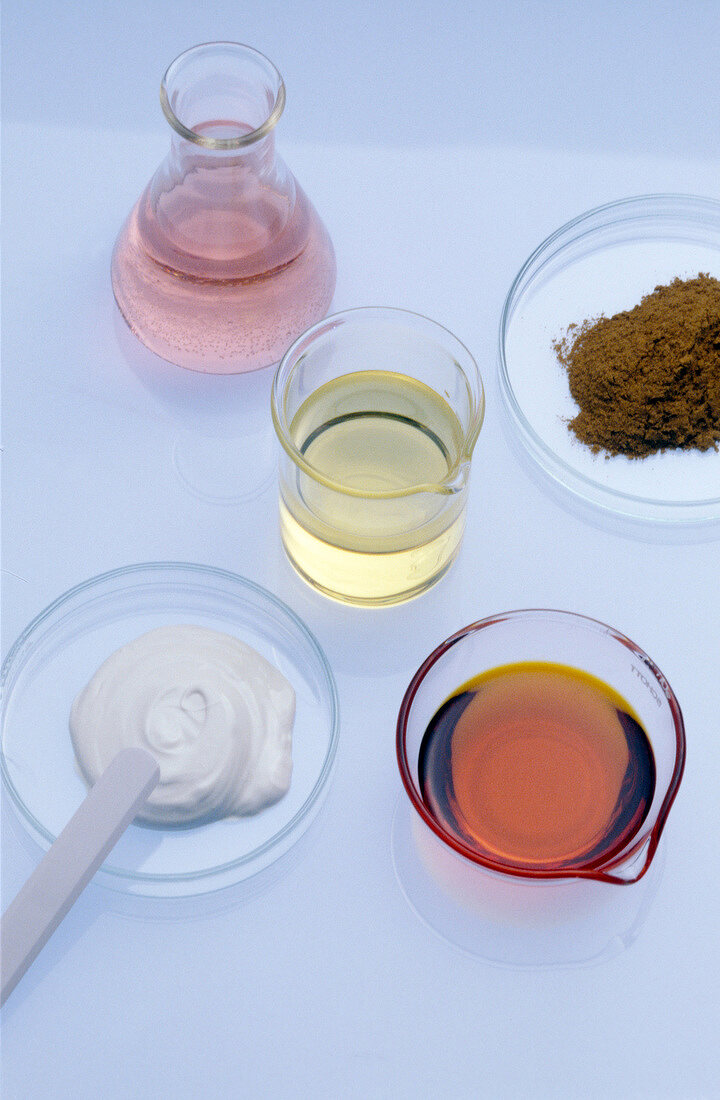 Close-up of ingredient for preparation of aloe vera cream on white background