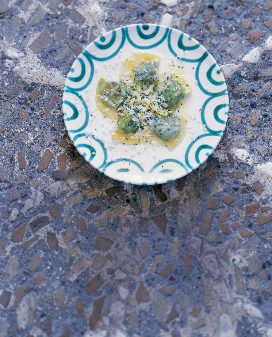 Ravioli with spinach, ricotta and parmesan on plate