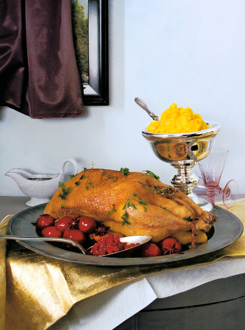 Stuffed goose with gingerbread sauce, pumpkin and potato puree