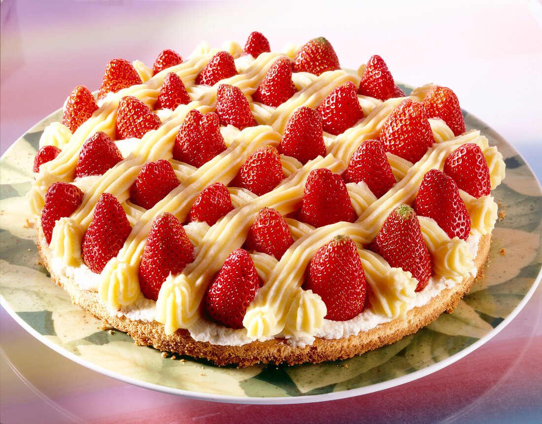 Close-up of strawberry cake with vanilla cream