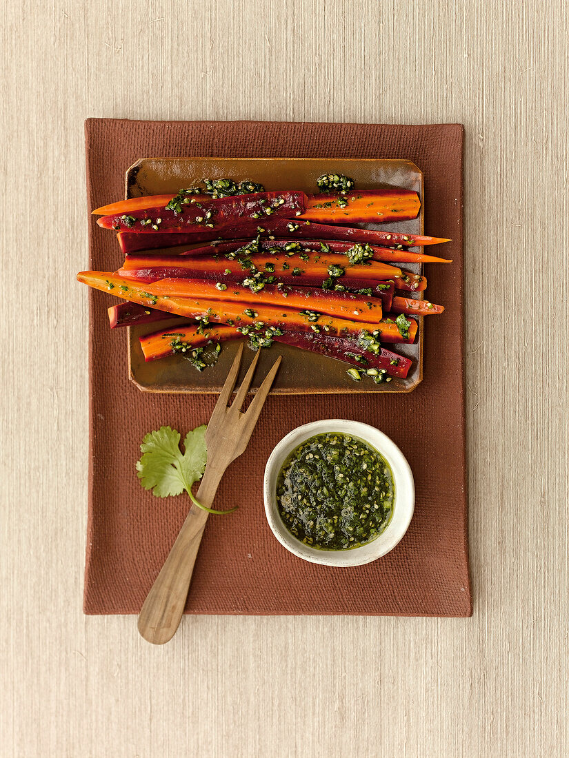 Marinated carrots served with coriander pesto, overhead view