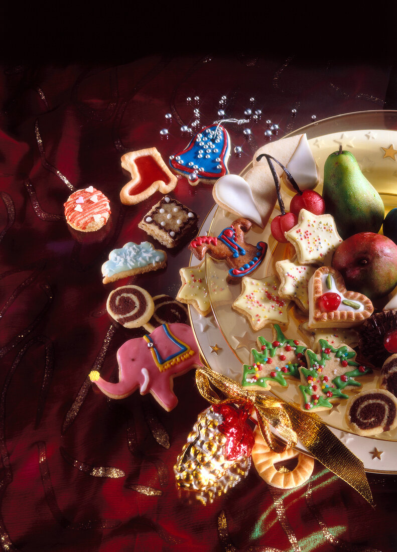 Close-up of different types of colourful cookies on plate