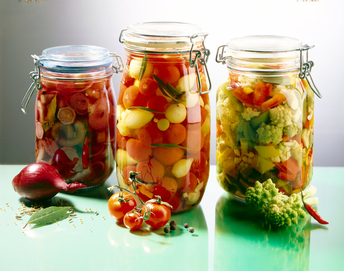 Canned vegetables filled in three jars
