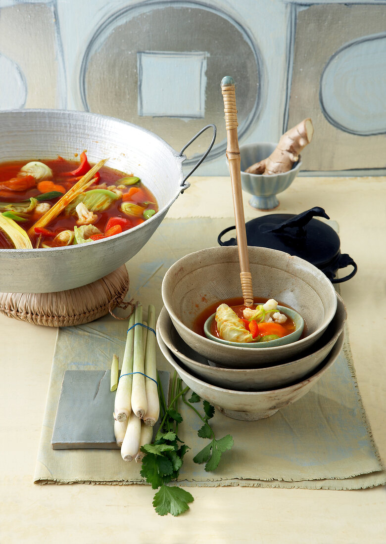 Asian cabbage soup with lemon grass in soup bowl