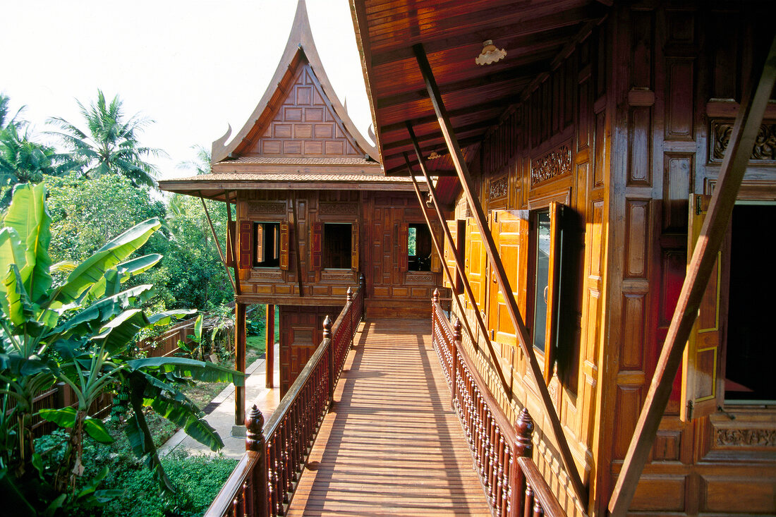 Traditional Asian wooden houses on stilts in Thailand