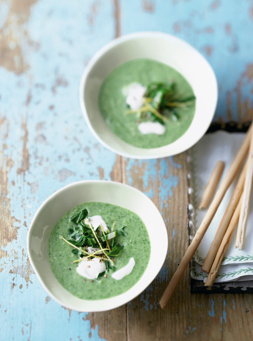 Cold beet soup with lemon oil in bowl