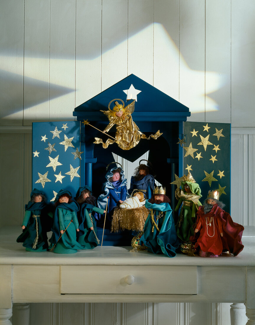 Christmas decoration with homemade figurines on table