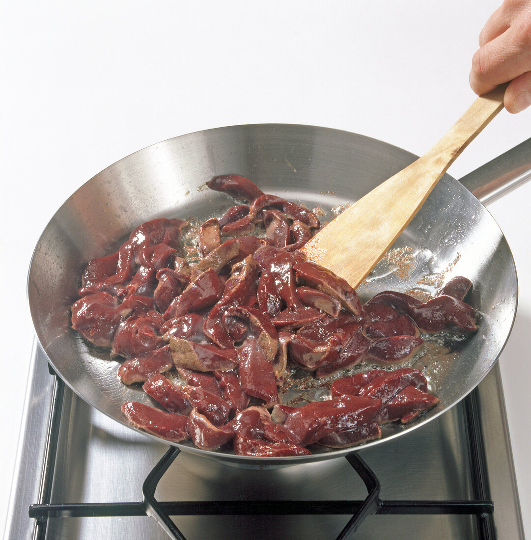 Boar liver being fried in pan, step 2
