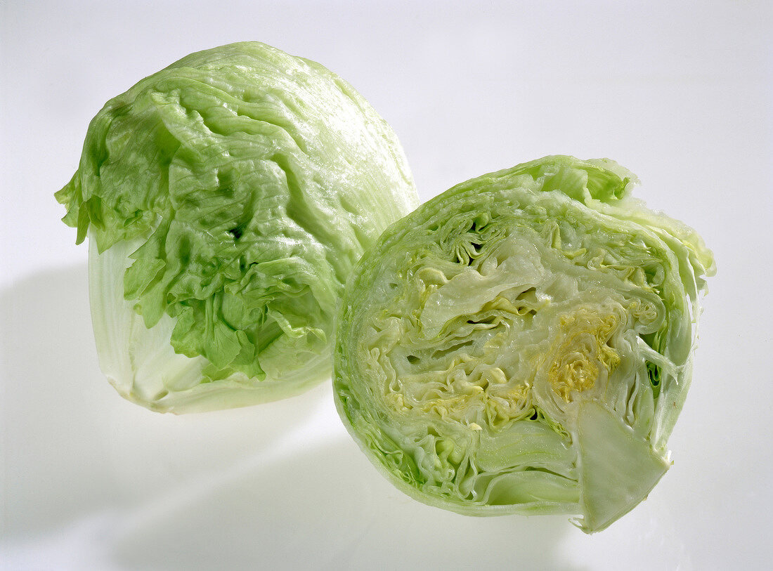 Green iceberg salad on white background