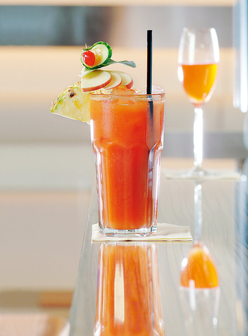 Glasses of two cocktails on the bar counter