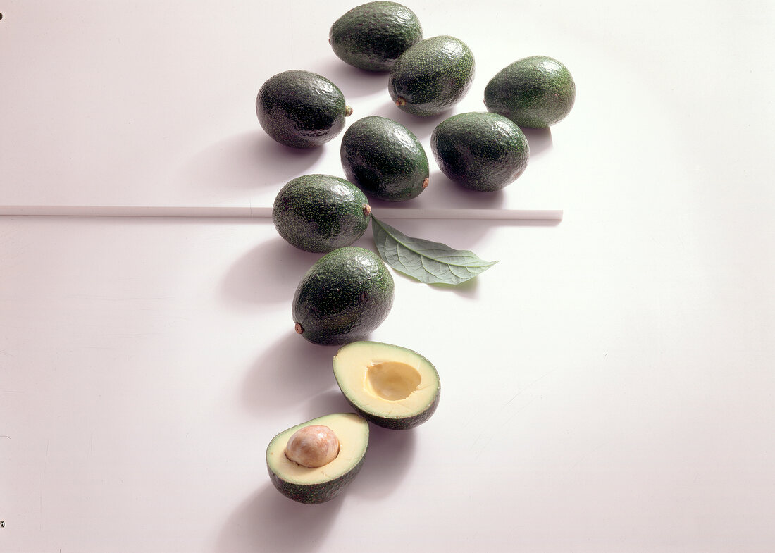 Reed avocados on white background