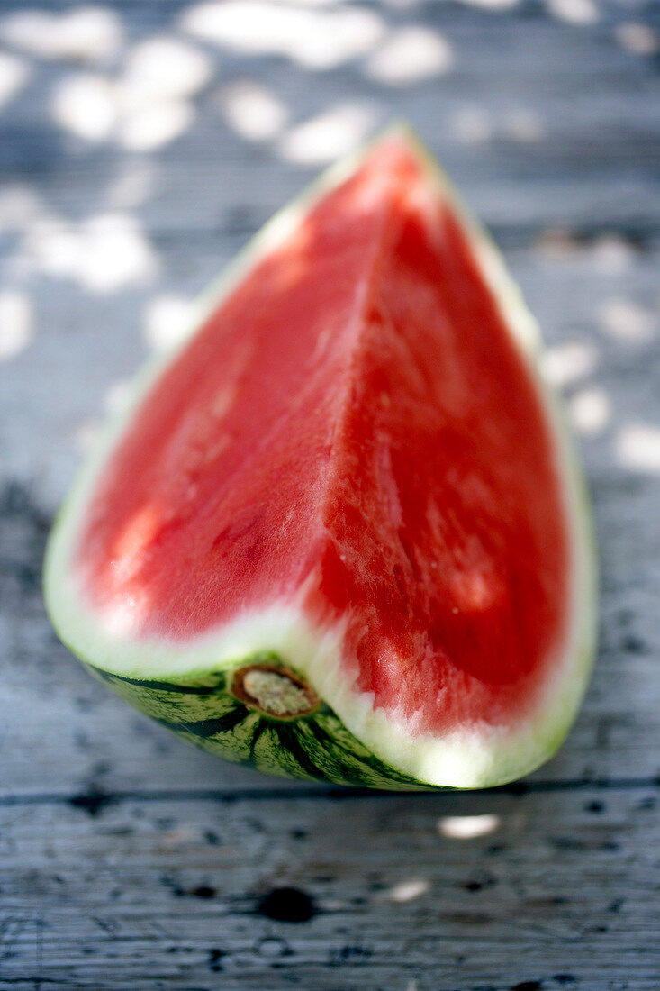 Close-up of cut watermelon on wooden table
