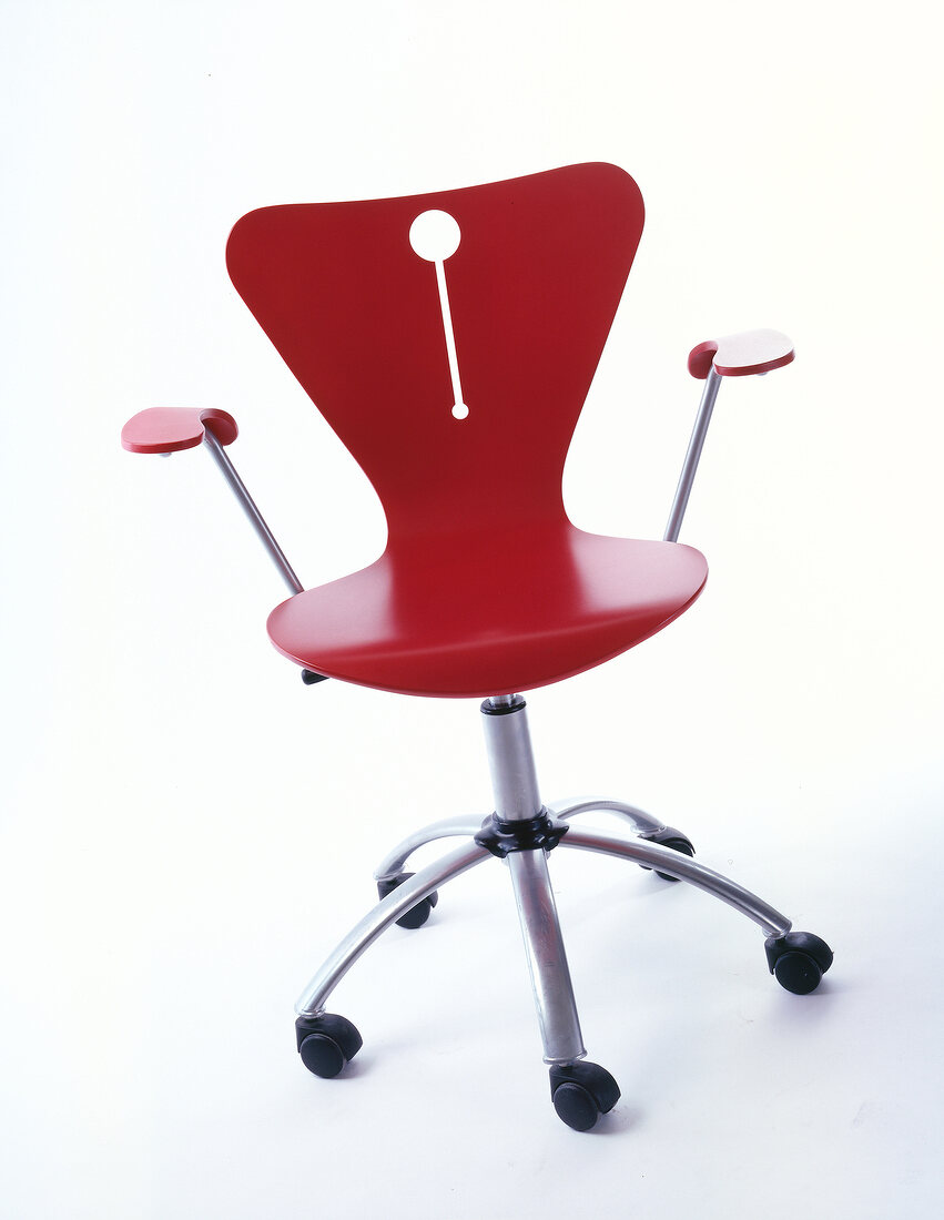 Red office chair against white background