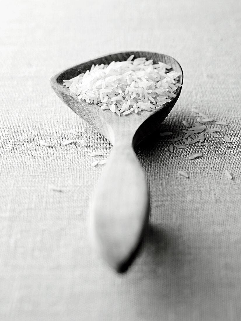 Basmati rice in wooden spoon, black and white