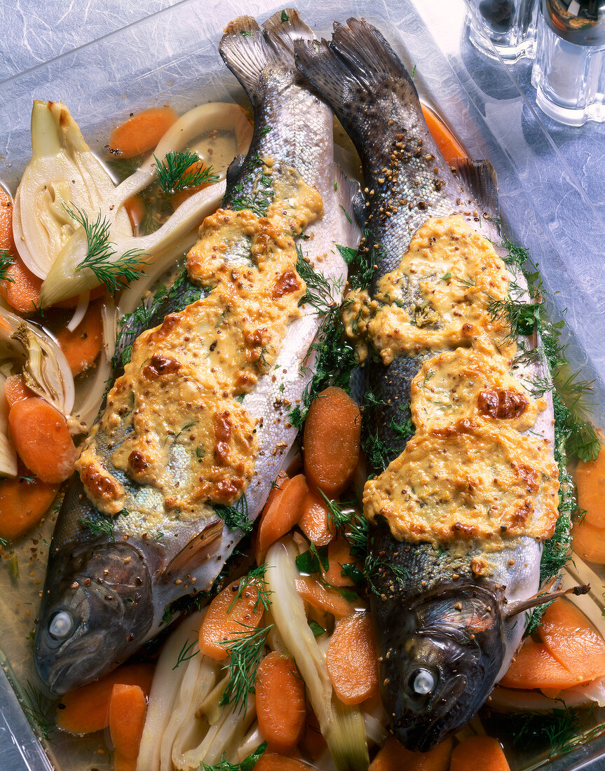 Stuffed trout with vegetables, carrots, dill and mustard