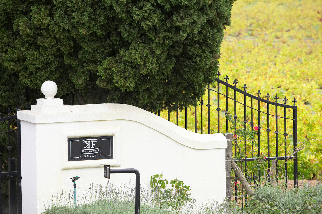 Entrance gate and company logo of Winery Ken Forrester, South Africa