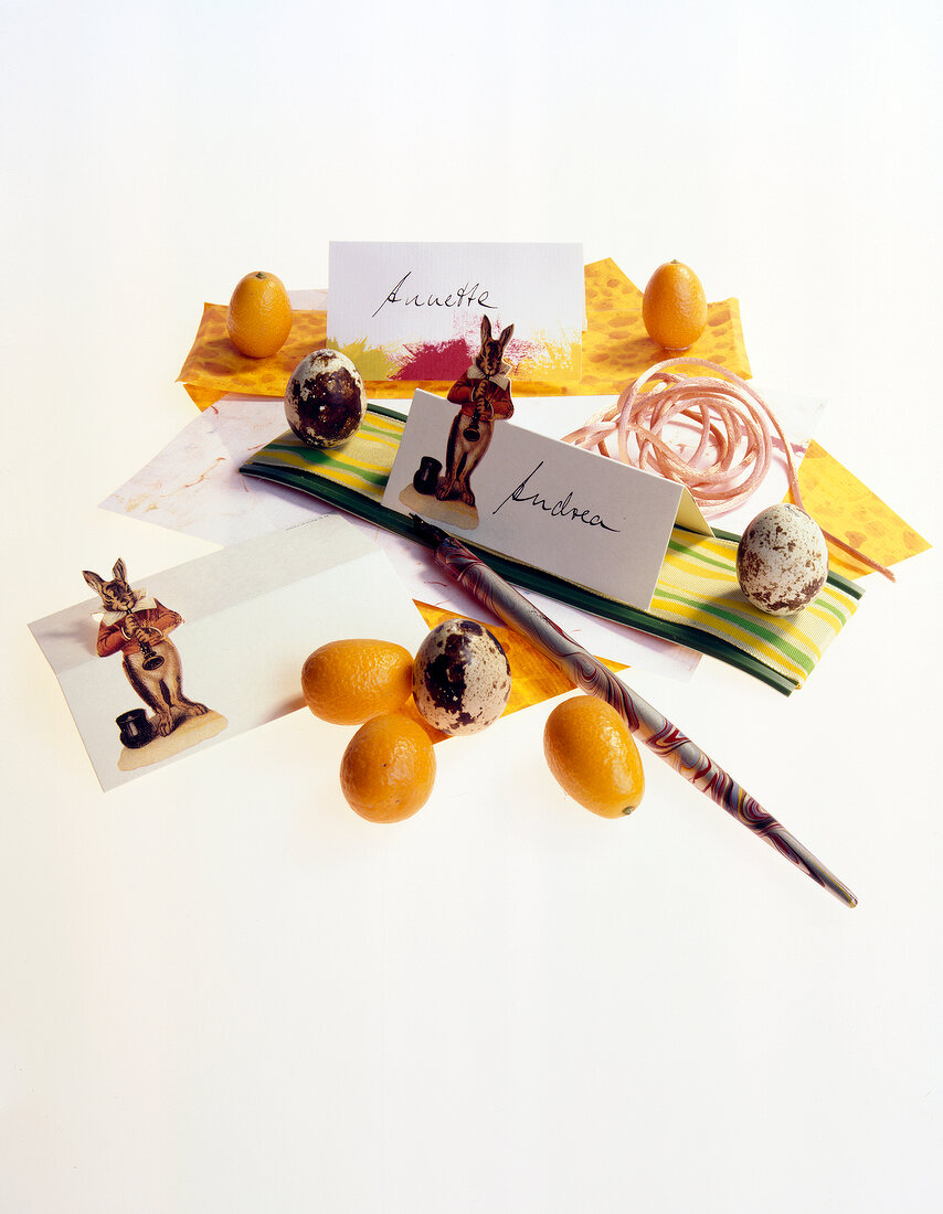 Close-up of place cards with Easter decoration and eggs