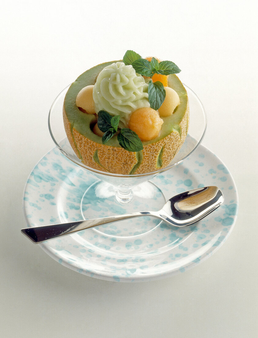 Melon sorbet with ice cream in glass bowl