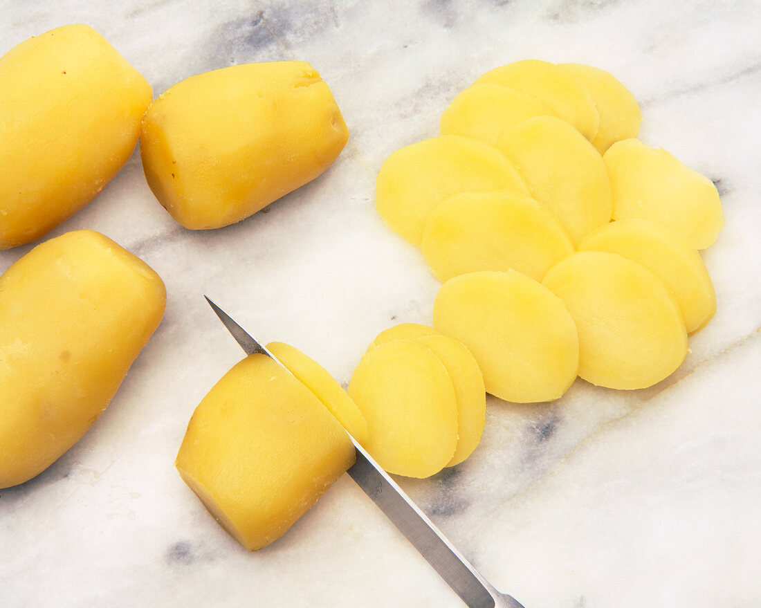 Potato slices on marble