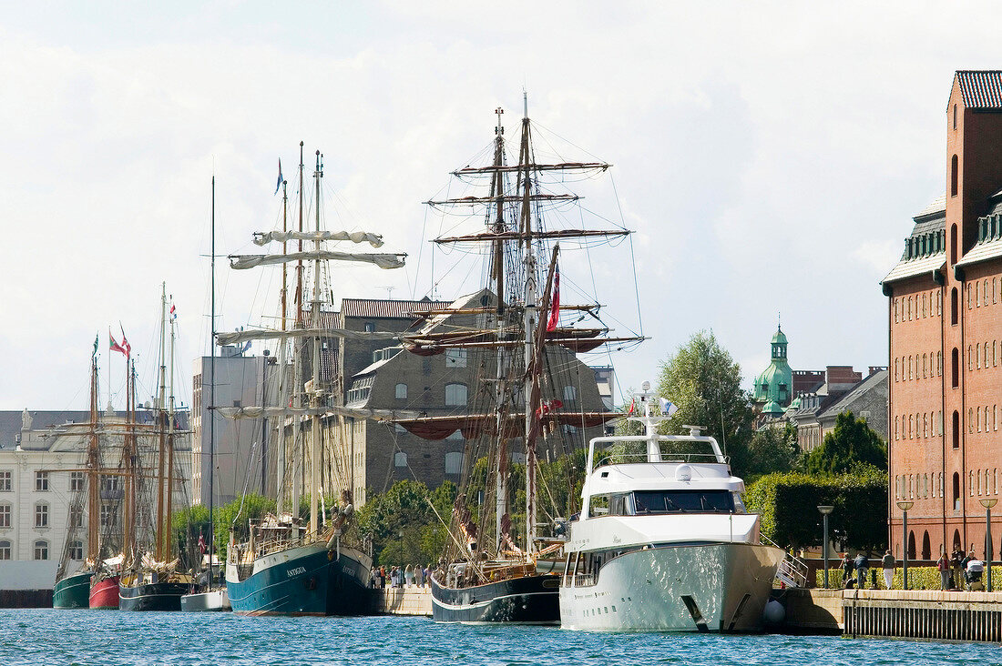 Sailboats moored in front of Hotel Admiral in Copenhagen, Denmark