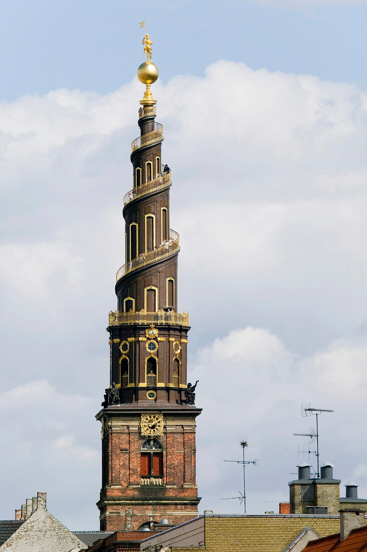 View of Church of Our Saviour between rooftops in Christianshavn, Copenhagen, Denmark