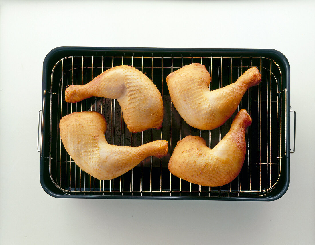 Smoked chicken legs on grill