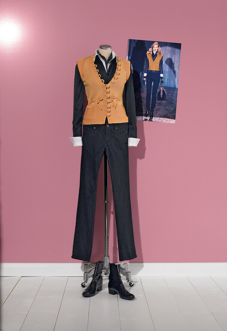 Mustard coloured vest, black pants and heels