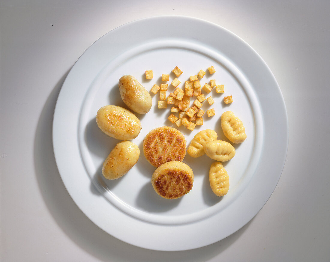 Potatoes in the form of gnocchi and other varieties on plate