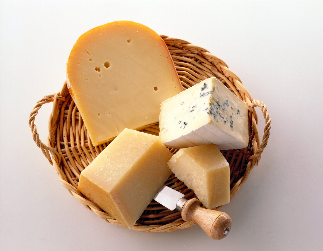 Varieties of cheese in basket