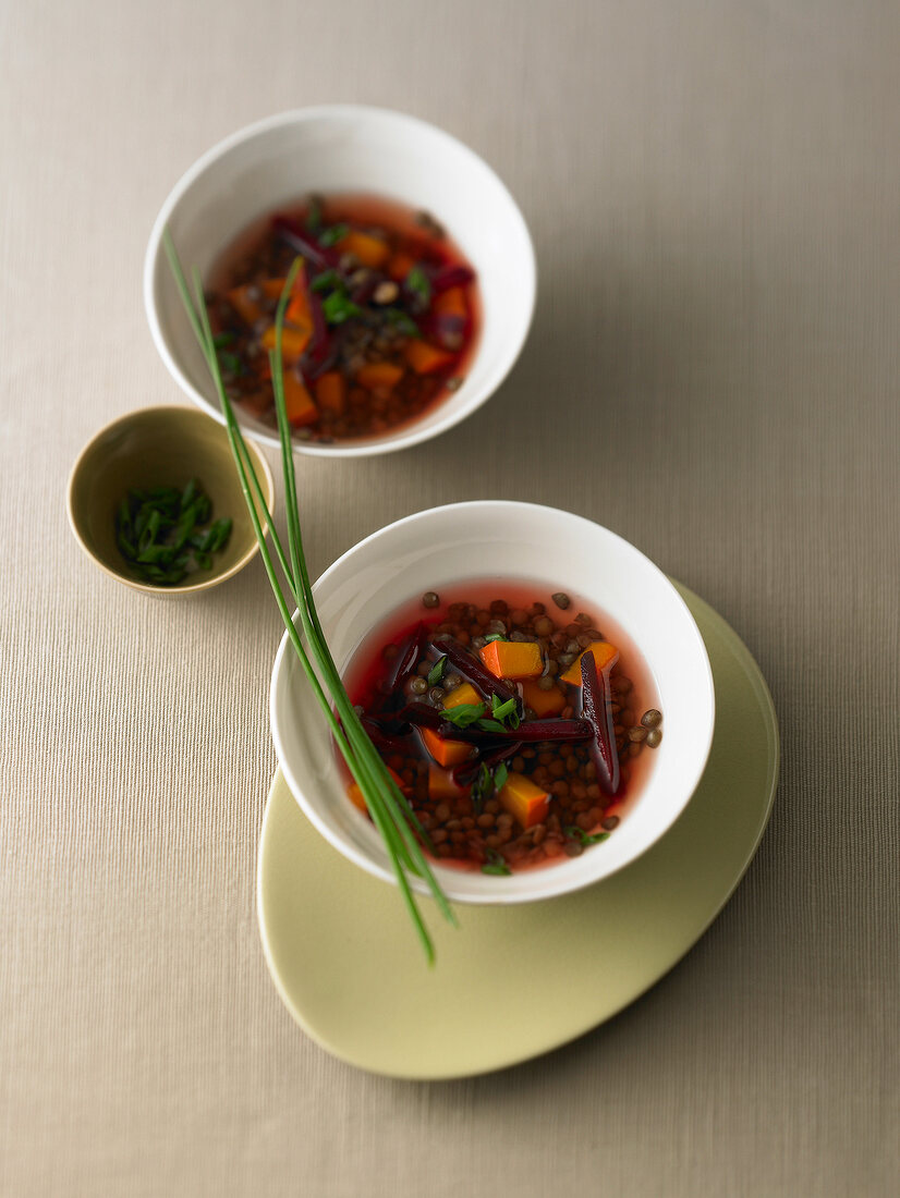 Bowls of pumpkin and lentil soup