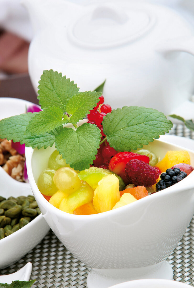 Fruits and mint in bowl