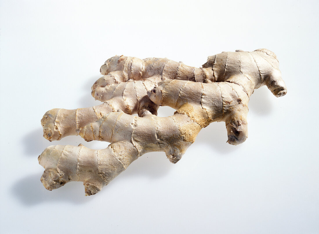Ginger roots on white background